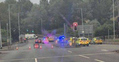 LIVE Police descend and huge scene in place following incident on Stockport road - updates