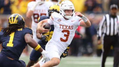 Quinn Ewers - Ewers throws for 3 TDs as Texas hands Michigan 1st loss since '22 - ESPN - espn.com - state Texas - state Alabama - state Michigan - county Davis - county Warren