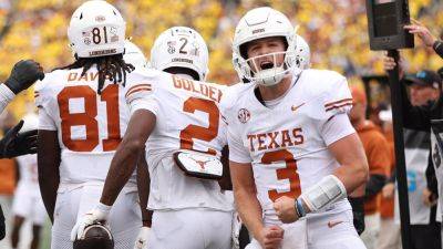 Paul Sancya - Urban Meyer - Jim Harbaugh - Sherrone Moore - Quinn Ewers - Quinn Ewers puts on stellar display, throws 3 touchdown passes as Texas routs Michigan - foxnews.com - state Indiana - state Texas - state Michigan - county Davis - county Moore - county Warren