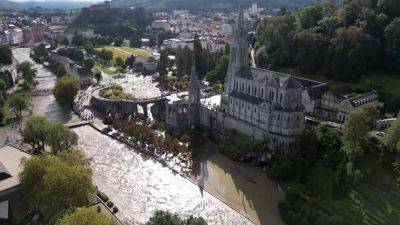 Christian pilgrims in Lourdes evacuated after nearby river overflows