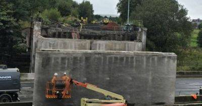 Latest pictures show demolition of bridge during M62 closure - manchestereveningnews.co.uk - Ireland