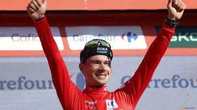 Tour De-France - Enric Mas - Tadej Pogacar - Remco Evenepoel - Jonas Vingegaard - Roglic reigns in Spain with record-equalling fourth Vuelta title - channelnewsasia.com - France - Spain - Australia - Slovenia