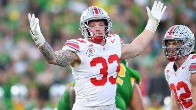 Favored Ohio State attracting lopsided betting vs. underdog Texas - ESPN
