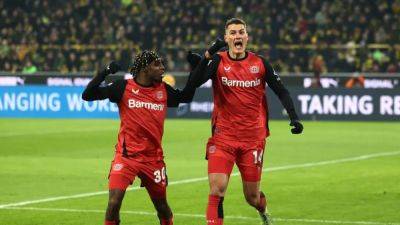 Leverkusen stun hosts Dortmund 3-2 to close on leaders Bayern