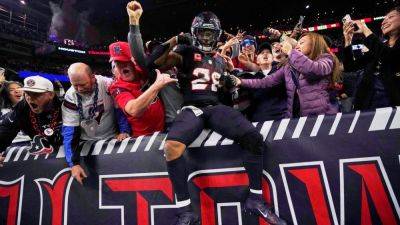 Joe Mixon - Justin Herbert - Jim Harbaugh - Nico Collins - Texans crush Chargers, force Justin Herbert into 4 INTs - ESPN - espn.com - Los Angeles