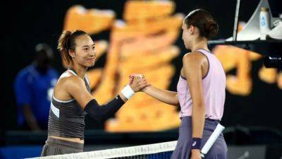Rusty Zheng into second round as Grand Slam tennis, rain return to Melbourne