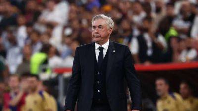 Edgy Ancelotti not in the mood to talk after heavy Barca loss