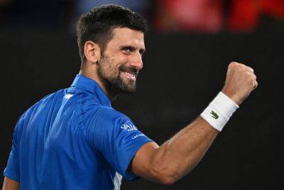 Record-setting Djokovic trumps Federer on way to Melbourne third round