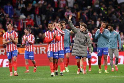 Atletico hold slender Liga lead as Spain’s big two resume battle