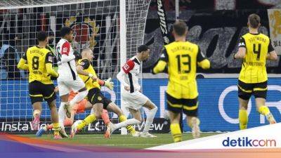 Borussia Dortmund - Hugo Ekitike - Eintracht Frankfurt - Ansgar Knauff - Bundesliga - Eintracht Frankfurt Vs Borussia Dortmund: Die Borussen Tumbang 0-2 - sport.detik.com