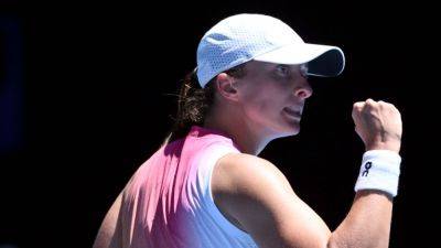 Emma Raducanu - Iga Swiatek - Karen Khachanov - Alex Michelsen - Emma Navarro - Iga Swiatek easily tops Emma Raducanu at Australian Open - ESPN - espn.com - France - Usa - Australia