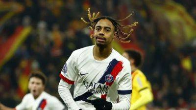 Barcola strikes late as PSG sink Lens
