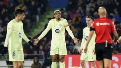 Robert Lewandowski - David Soria - Jules Kounde - Lacklustre Barcelona held to 1-1 draw by Getafe - channelnewsasia.com - France
