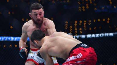 Georges St Pierre - Dvalishvili closes in style to edge Nurmagomedov at UFC 311 - ESPN - espn.com