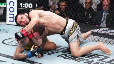 Charles Oliveira - Alexander Volkanovski - Islam Makhachev quickly taps Renato Moicano in UFC 311 main event - ESPN - espn.com
