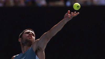 Alcaraz through to Australian Open quarters after Draper retires