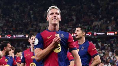 Barcelona's Olmo sidelined with calf injury