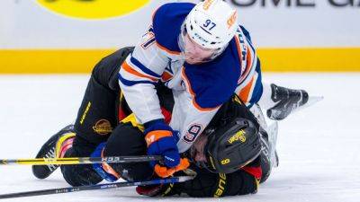 Oilers' Connor McDavid, Canucks' Tyler Myers facing suspensions - ESPN