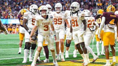 Texas shows 'fight' in 2OT classic, reaches CFP semifinals - ESPN