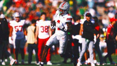 Rose Bowl - Garrett Wilson - Chris Olave - Emeka Egbuka - Marvin Harrison-Junior - Will Howard - Ohio State's Jeremiah Smith breaks Big Ten's freshman TD receiving record - foxnews.com - state Oregon - state Tennessee - state Ohio