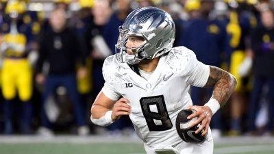 Oregon quarterback Dillon Gabriel suggests football games should be played without bad weather