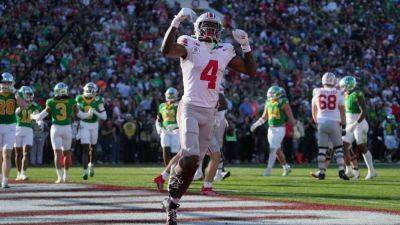 Ohio State answers critics with rout of Oregon in CFP quarters - ESPN