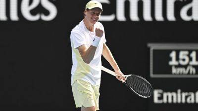 Sinner outlasts Rune after net issue pauses Australian Open match - ESPN
