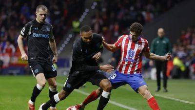 Alvarez scores twice as Atletico fight back to beat Leverkusen 2-1
