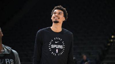 Victor Wembanyama takes in Man City-PSG Champions League match - ESPN - espn.com