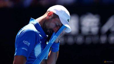 Djokovic retires injured to put Zverev into Australian Open final