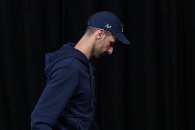 Djokovic retires hurt to send Zverev into Australian Open final