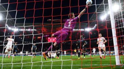 Leverkusen squander two-goal lead to draw 2-2 at Leipzig