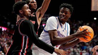 J'Wan Roberts, No. 7 Houston down No. 12 Kansas in double OT - ESPN - espn.com - state Kansas - state Utah - county Roberts - county Lawrence