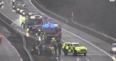 Traffic held on M4 after crash as car left in central reservation