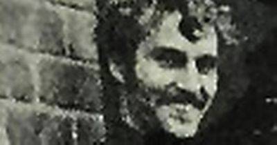 After 50 years police are still hunting the angry man who called at a Bury garage the day before a murder