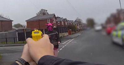 Horror footage of moment officer detains man armed with kitchen knife in street