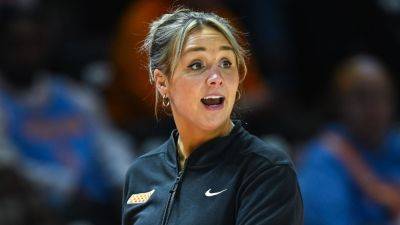 Tennessee's Kim Caldwell coaches vs. S.C. after giving birth - ESPN