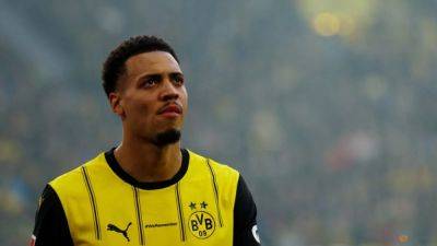 Borussia Dortmund - Waldemar Anton - Felix Nmecha - Edin Terzic - Dortmund midfielder Nmecha out for weeks with knee injury - channelnewsasia.com - Ukraine - Turkey