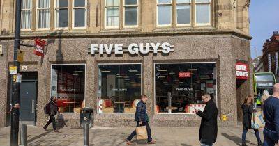 Security guards left injured after violent attack at Manchester Five Guys
