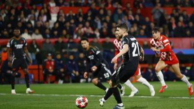 Arsenal clinch Champions League last 16 spot with a 2-1 comeback win at Girona