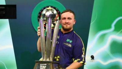 Darts-Luke 'The Nuke' Littler downs Van Gerwen 7-3 to become youngest champ