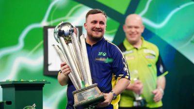 Luke Littler beats Michael van Gerwen to become a teenage world champion at Ally Pally