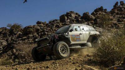 Sebastien Loeb - Nasser Al-Attiyah - Carlos Sainz - Yazeed Al-Rajhi - Rallying-Chicherit wins opening Dakar stage as favourites hold back - channelnewsasia.com - Usa - Saudi Arabia