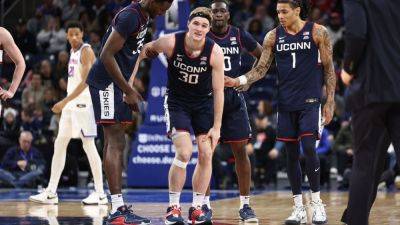 UConn freshman Liam McNeeley to miss 'weeks' with ankle injury - ESPN