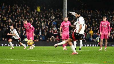 Jimenez converts two penalties to rescue Fulham in 2-2 draw with Ipswich