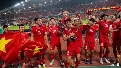 Late goals earn Vietnam ASEAN Championship win over 10-man Thais