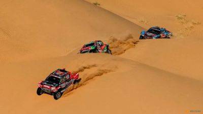 Nasser Al-Attiyah - Carlos Sainz - Yazeed Al-Rajhi - Rallying-Sainz says his Dakar defence is over as Lategan leads - channelnewsasia.com - Britain - Qatar - Usa - Australia - South Africa - Saudi Arabia - county Price