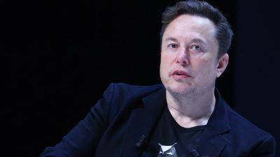 Elon Musk - John W.Henry - Elon Musk would be interested in buying Liverpool, says father - rte.ie - Liverpool