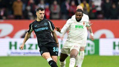 Leverkusen's Xhaka racing to get fit for Dortmund game, says coach