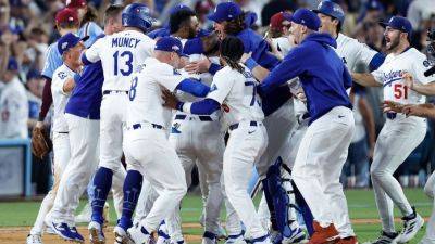 Philadelphia Phillies - Nick Castellanos - Max Muncy - Rob Thomson - Dodgers win in 11 innings after Orion Kerkering's costly error - ESPN - espn.com - Los Angeles - state Indiana - county Page